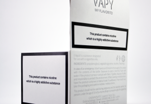 a packaging with VAPY logo on it and a text: this products contains nicotine which is highly addictive substance
