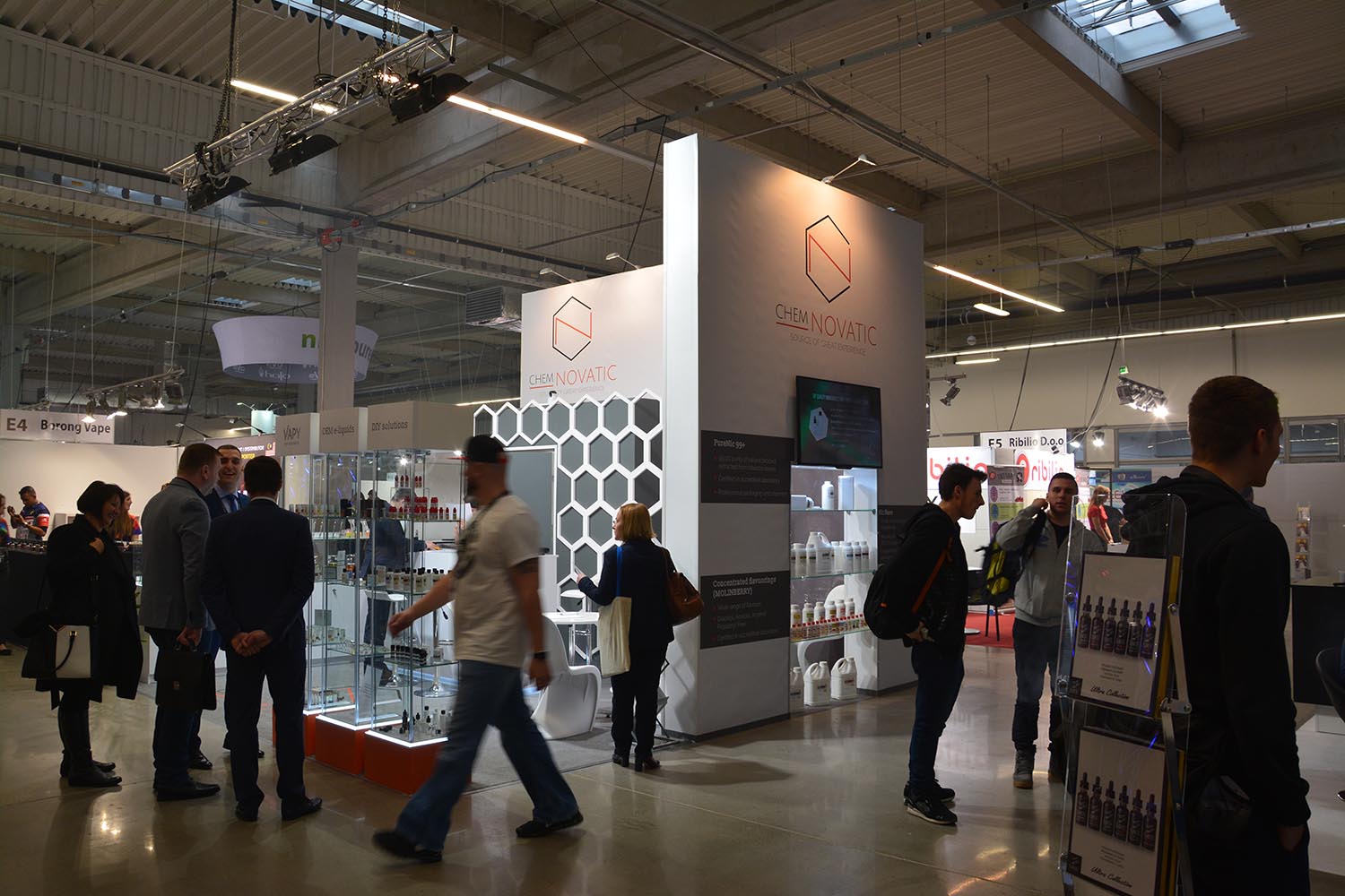 a photo of chenovatic stand and people around it during the expo