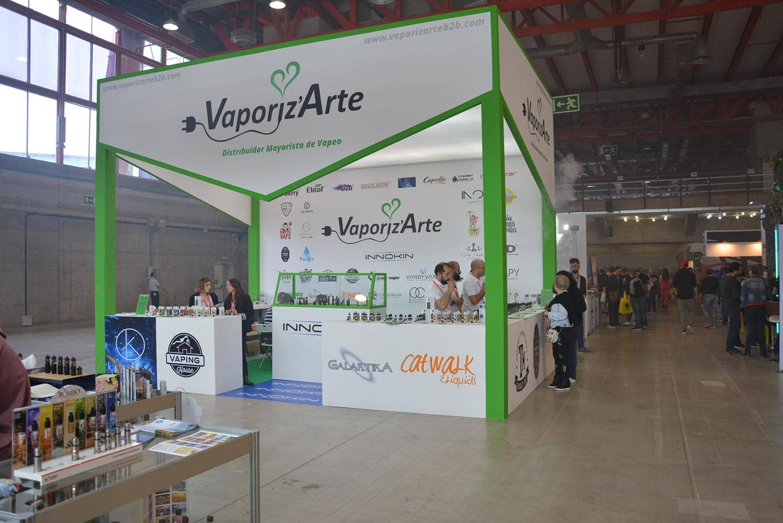 people at vaporiz'arte stand during vapeexpo 2018 spain
