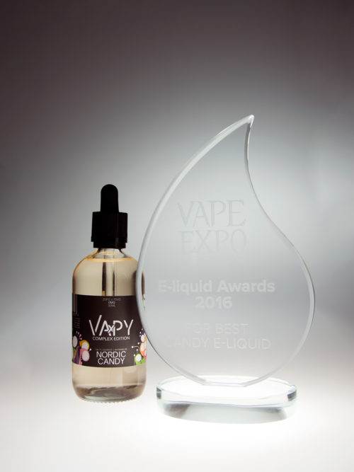 vapy nordic candy e-liquid bottle and an award next to it